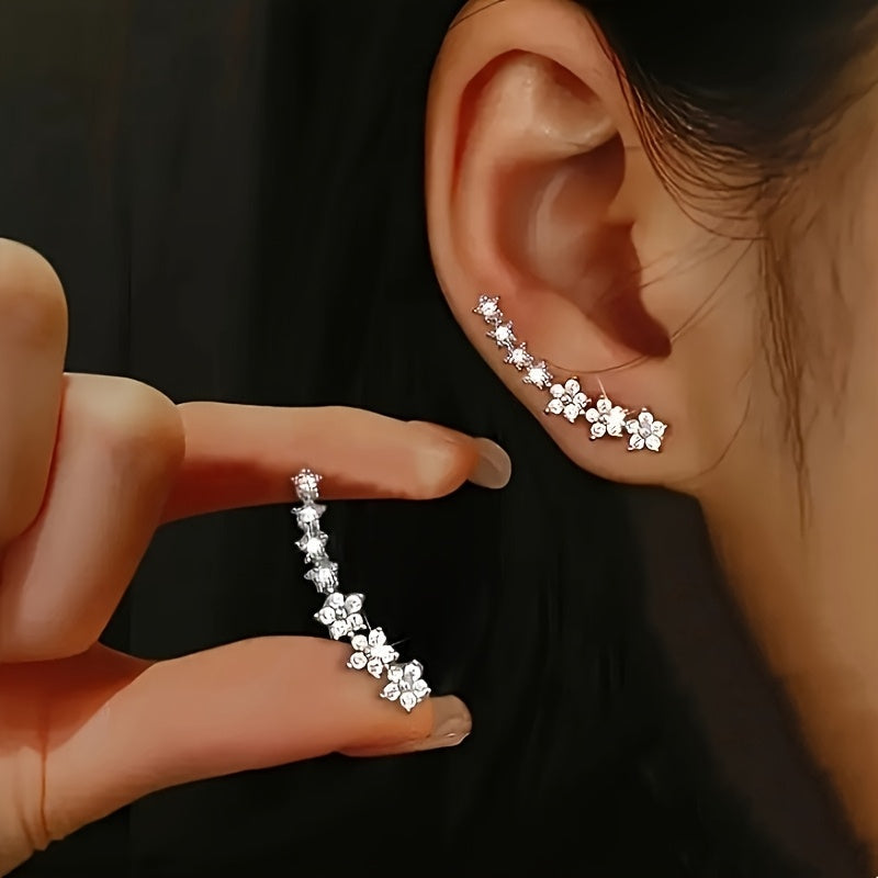 Élégantes boucles d'oreilles florales en argent, au style intemporel