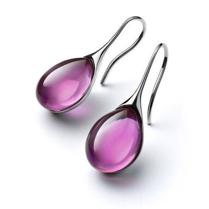 Élégantes boucles d'oreilles pendantes ornées de cristaux