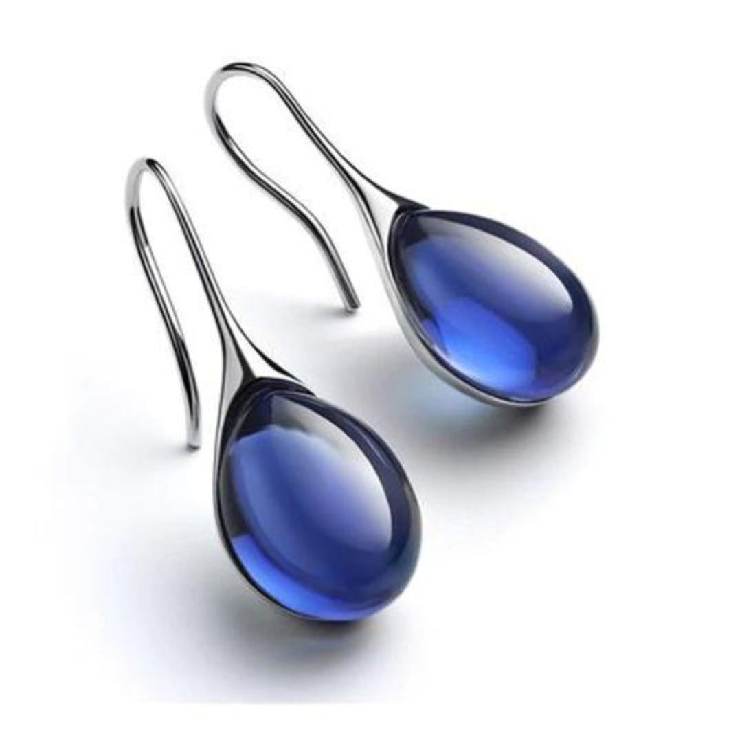 Élégantes boucles d'oreilles pendantes ornées de cristaux