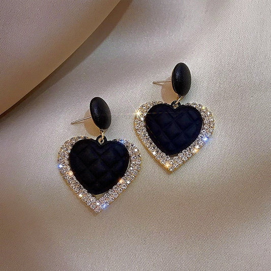 Pendientes de corazón en oro negro