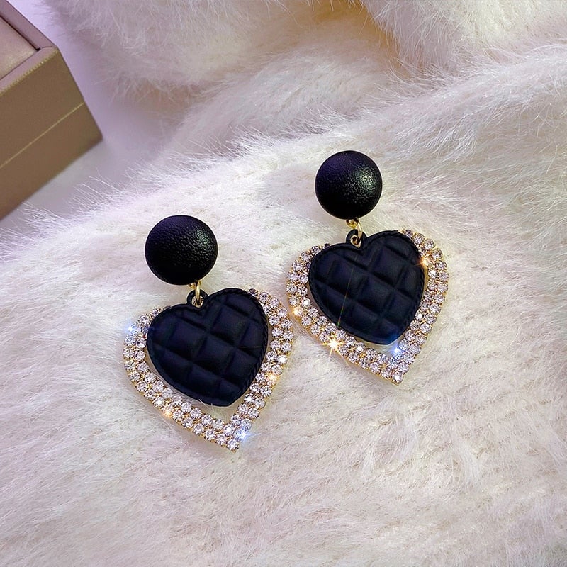 Boucles d'oreilles cœur en or noir